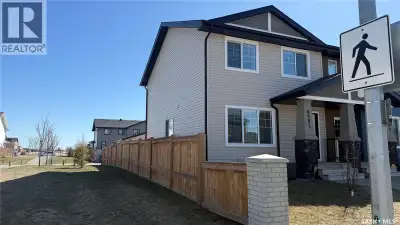 Welcome to this stylish and well-appointed 1,360 sq ft attached townhouse in the sought-after Wester...