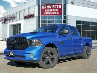 The 2022 Ram 1500 Classic Express is a statement in bold blue, boasting a powerful 4x4 drivetrain th...