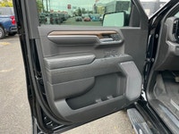 The 2023 Chevrolet Silverado 1500 High Country is an impressive black 4x4 truck that combines power... (image 9)