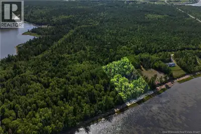 WATERFRONT !!! Discover the potential of this beautiful waterfront property in the peaceful communit...