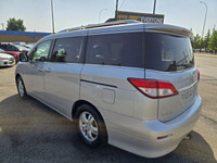 The 2011 Nissan Quest is a family-focused minivan that delivers comfort, space, and smooth performan... (image 2)