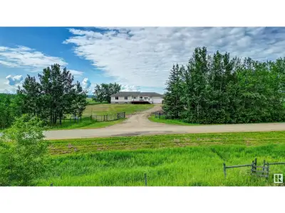 This acreage home is approximately 1800 sqft., with 3 bedrooms & 3 bathrooms on the main floor, incl...