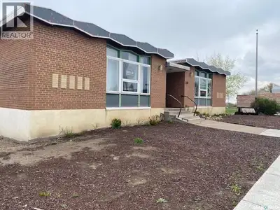 A unique, multi-use commercial building located on a huge corner lot (100’x120’) in the Town's busin...