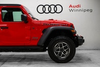 Why buy new? Save over $14,900 + tax from new on this ultra low KM 2026 Jeep Wrangler 4-Door 4x4 Rub... (image 4)