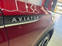 Experience the sophisticated elegance of the 2020 Lincoln Aviator Reserve in a stunning red exterior... (image 4)