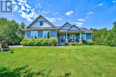 Stunning custom-built Luxart estate home set on a private, treed 1.5+ acre lot in a sought-after rur...
