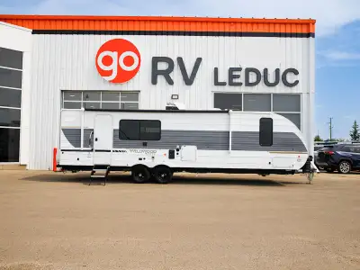 The 2026 Wildwood 28ICE by Forest River is a spacious, family-friendly travel trailer designed for c...