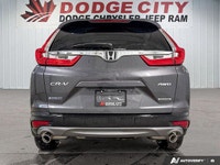 The 2018 Honda CR-V Touring AWD delivers premium comfort, advanced safety, and confident all-weather... (image 4)