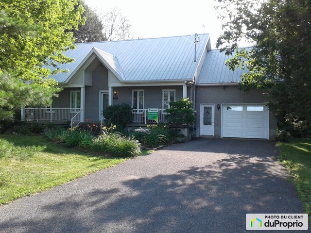 $599,000 - Bungalow for sale in Pike River — photo 1