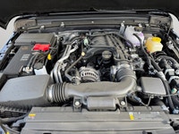 This 2025 JEEP WRANGLER 4-DOOR SPORT has the following options Cloth Low-Back Bucket Seats, Uconnect... (image 8)