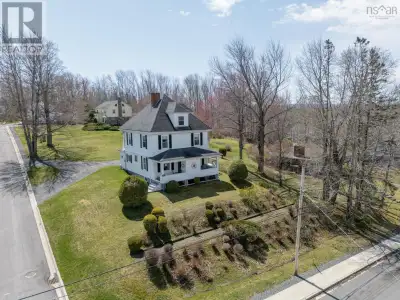 Timeless Charm Meets Modern Comfort in This 1922 Classic! Step into a piece of history with this bea...