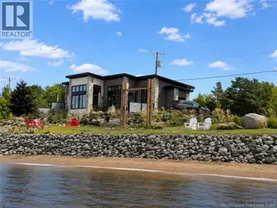 Waterfront living at its finest! Newly built modern home on a dbl lot along the Richibucto River off...