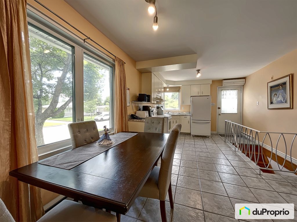 70e rue Est — photo 3