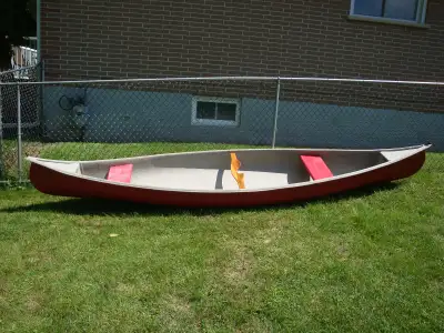 15 Foot Fiberglass Versatile Canoe. Durable and Easy to Maintain. In Good shape. Great for Tripping...