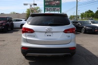 Experience comfort, capability, and reliability with this 2016 Hyundai Santa Fe AWD Luxury. With its... (image 5)
