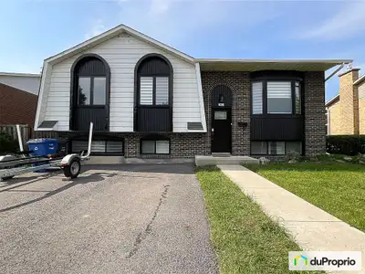 Un décor actuel et de très bon goût - Propriété de 5 chambres dans un secteur familial entouré de vo...