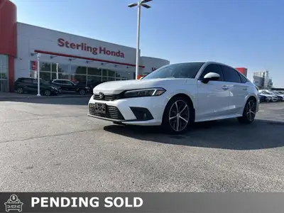 Experience the refined elegance and exhilarating performance of this 2023 Honda Civic Sedan Touring,...