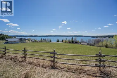 With sweeping views over beautiful Bridge Lake, this sunny south-facing almost 2 acre property gives...