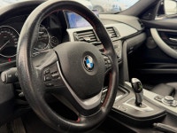 The 2013 BMW 328i xDrive F30 represents the transition to the high-efficiency, turbocharged four-cyl... (image 4)
