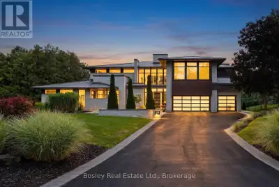 Set on 242 ft of pristine Grand River frontage on 3+ acres overlooking Ontario's last remaining cove...