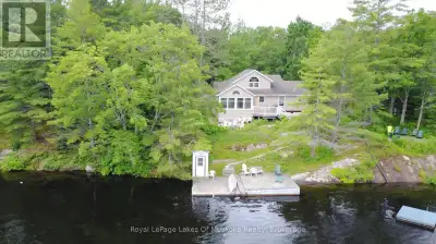 Welcome to this spacious and inviting 6-bedroom, 2-bath year-round home or cottage on very sought af...