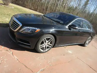 BLACK BEAUTY with only 50,600 original kms. Rebuilt title. Runs and drives as new. $39,500. Cash/tra...