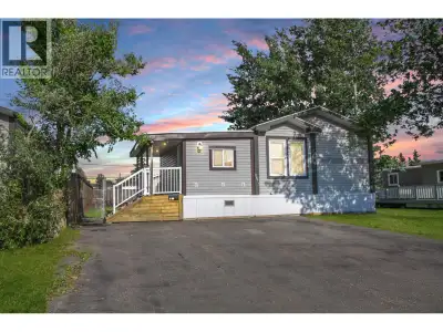 This wonderful 20' wide mobile home is tucked away on a quiet dead-end street with a triple paved dr...
