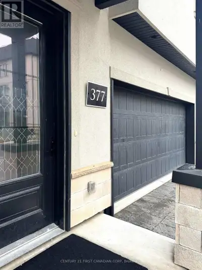Corner unit 2103 sq ft Brindelle model. This French-Inspired Townhome in Sought-After Sunningdale -...