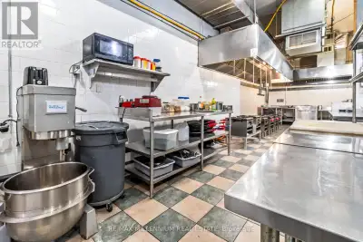 Turnkey 1900 sq ft commercial kitchen available with lease secured to 2029. Outfitted with top-grade...
