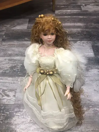 Stand up angel wingbporcelain doll for sale. Used, well taken care of, like new. Would make a great...