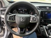 A practical compact SUV with a spacious interior, efficient performance, and modern safety features,... (image 9)