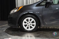 The 2017 Kia Rio LX Hatchback is a practical and fuel-efficient vehicle thats perfect for daily comm... (image 9)