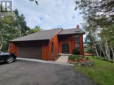 Welcome to 411 Malcolm's Rd. This piece of paradise on the Mira River certainly doesnt disappoint. S...