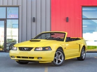 Carget Supercentre is proud to present this 2003 Ford Mustang GT Convertible! EXTERIOR: ZINC YELLOW... (image 2)