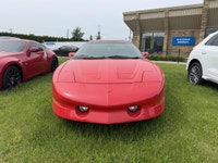 La Pontiac Firebird Trans Am 1994 est lun des modèles les plus emblématiques de lère des voitures sp... (image 1)