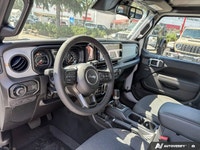 This Jeep Wrangler boasts a Regular Unleaded V-6 3.6 L/220 engine powering this Automatic transmissi... (image 9)