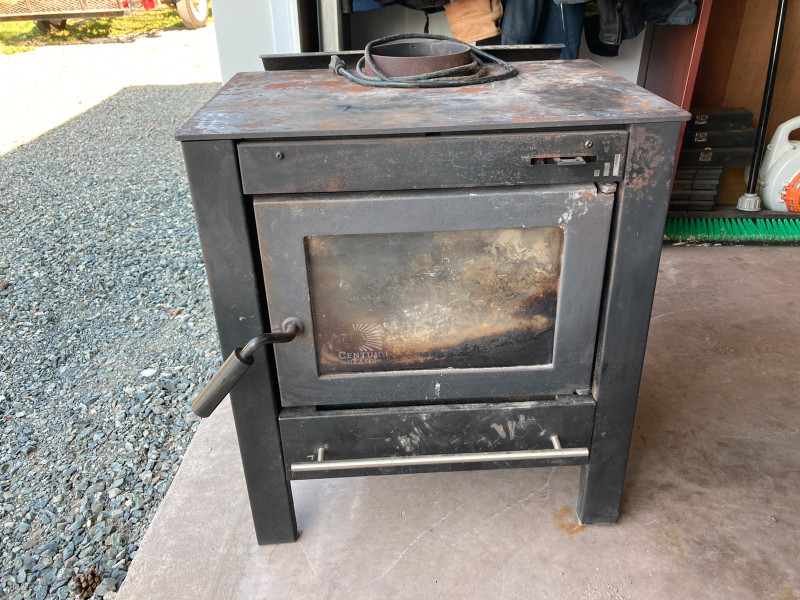 Air tight wood stove with pipe for sale  