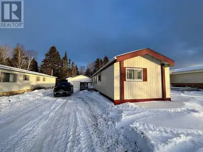 Welcome to this inviting spacious mobile home, perfectly positioned on a large, private lot that off...