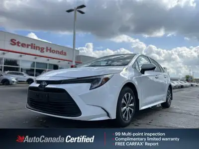 This 2023 Toyota Corolla Hybrid LE boasts impressive fuel efficiency and a smooth, comfortable ride,...