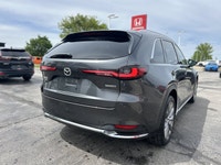 Experience the elevated elegance and advanced performance of the 2025 Mazda CX-90 MHEV GT. This soph... (image 4)