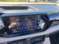 Experience confident city driving and weekend adventures in the 2024 Volkswagen Taos Trendline, a tu... (image 5)