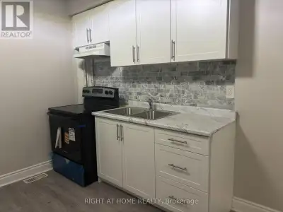 Welcome to 511 OAKWOOD AVE - Main Floor, a comfortable 2-bedroom, 1-bathroom apartment featuring a p...