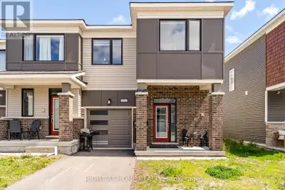 Welcome to this exceptional 2023-built end-unit townhome, where modern design meets everyday comfort...