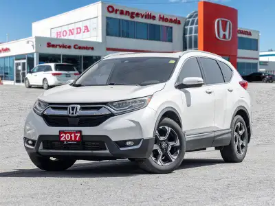 Discover refined comfort and confident capability with the 2017 Honda CR-V Touring AWD. Finished in...