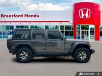 Designed to conquer both rugged trails and urban landscapes, this 2021 Jeep Wrangler Unlimited Rubic... (image 7)