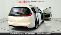 The 2022 Chrysler Pacifica Touring L is a family-friendly minivan that offers a comfortable ride, a... (image 8)