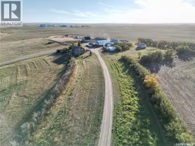 This farm is located just outside Moose Jaw city limits. The farm yard features a house, quonset, me...