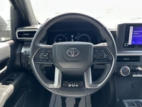 * Suspension: Red TRD sport-tuned shocks for improved on-road handling. * Exterior: 18-inch TRD allo... (image 6)