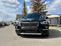 The 2018 X1 xDrive28i serves as a versatile "Sports Activity Vehicle" SAV tailored for urban environ... (image 3)