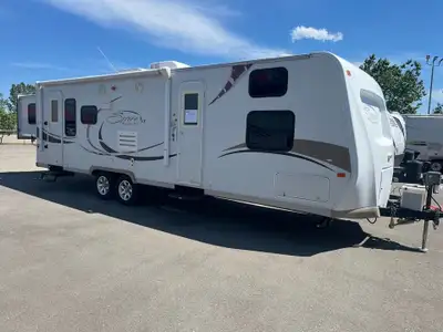 The 2010 Spree 289KS is a bunkhouse travel trailer built to handle family adventures without feeling...